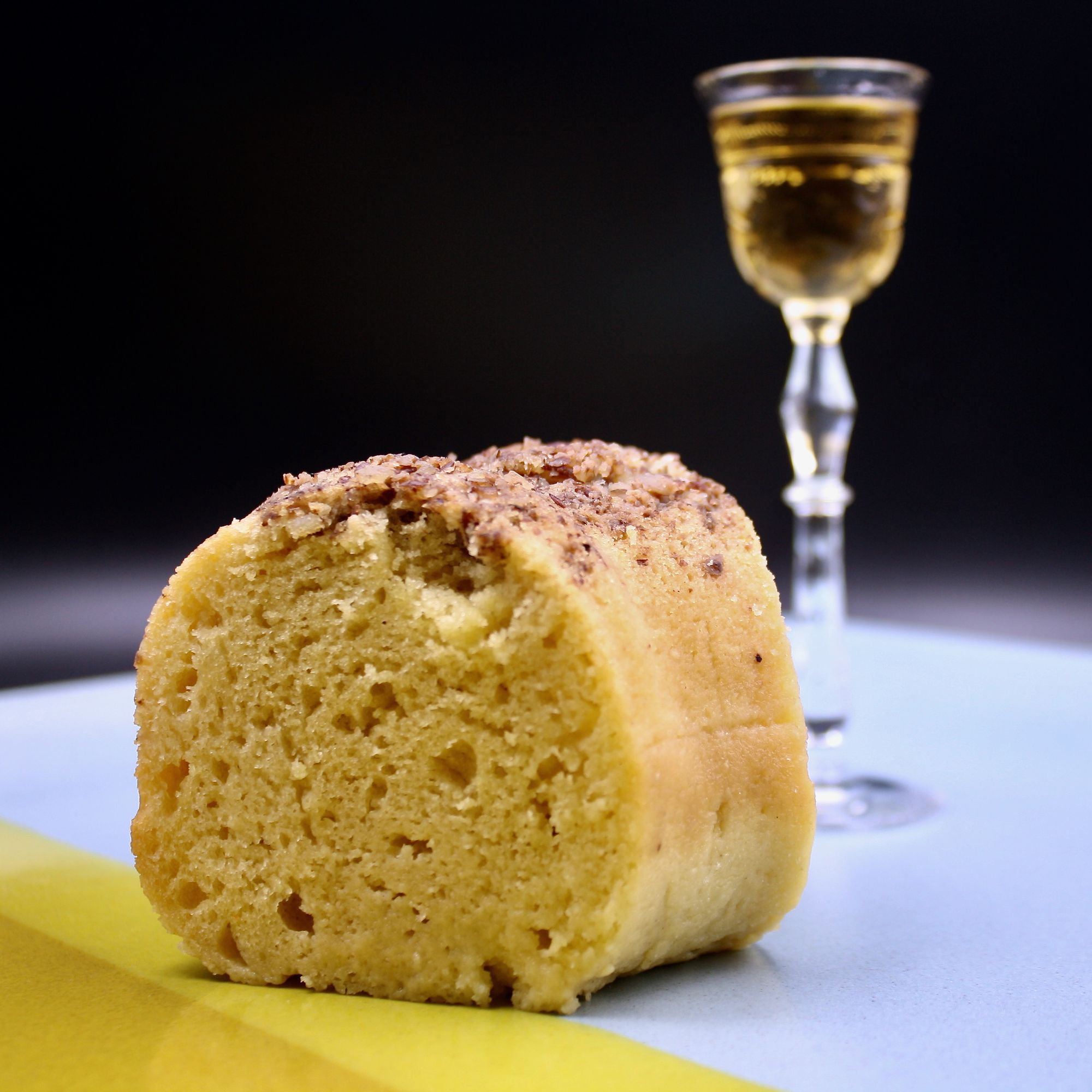 Jamaican rum cake with glass of Pekut & Carwick rum